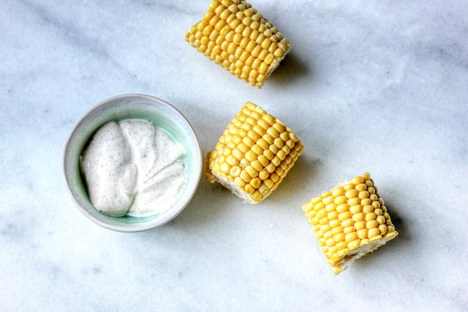 Corn on the cob with massala yoghurt