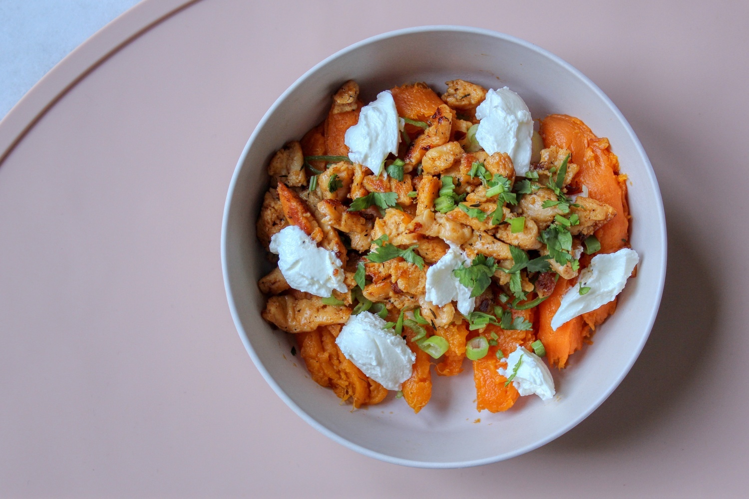 Loaded sweet potato with meat substitute and sour cream