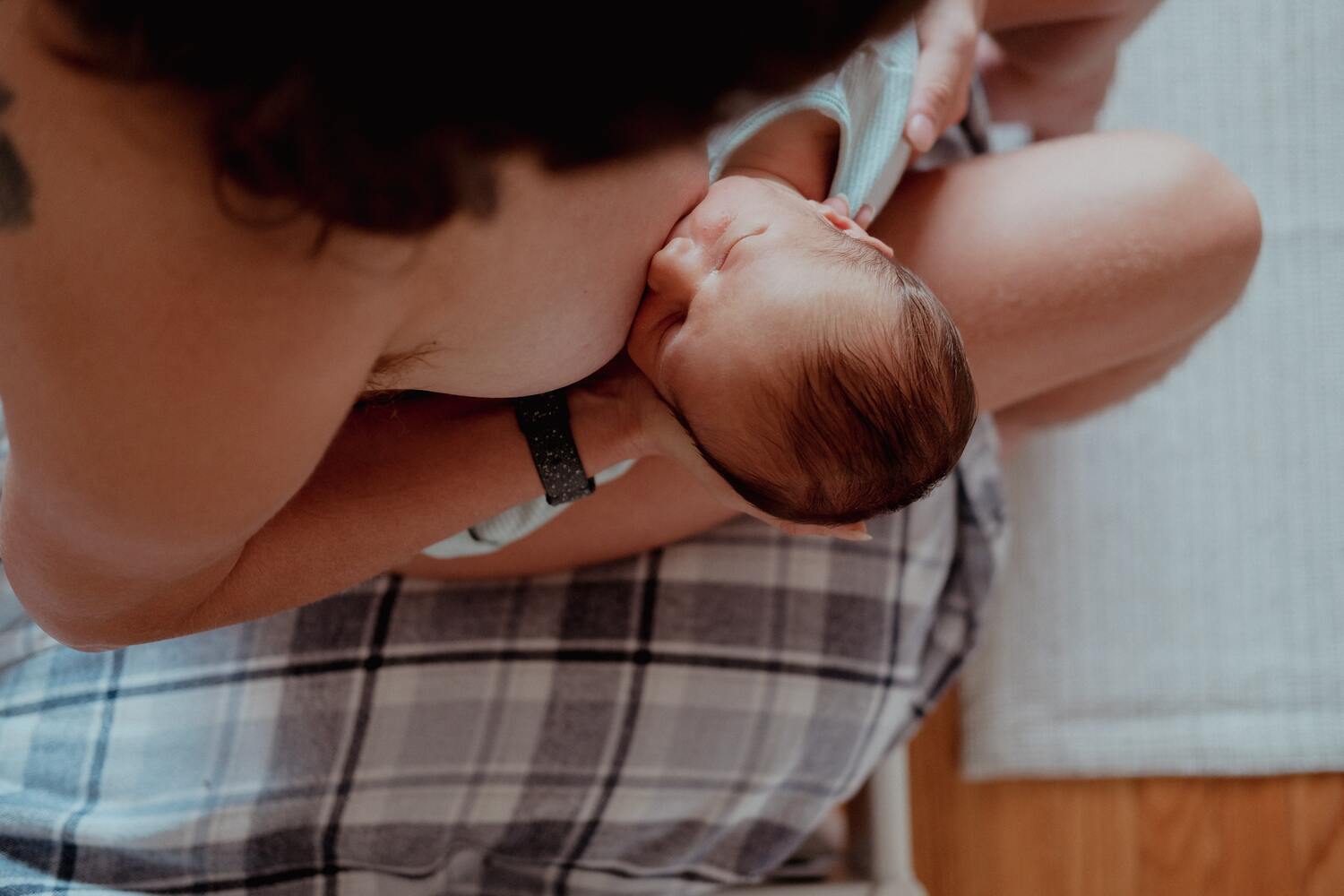 Mother breastfeeding baby